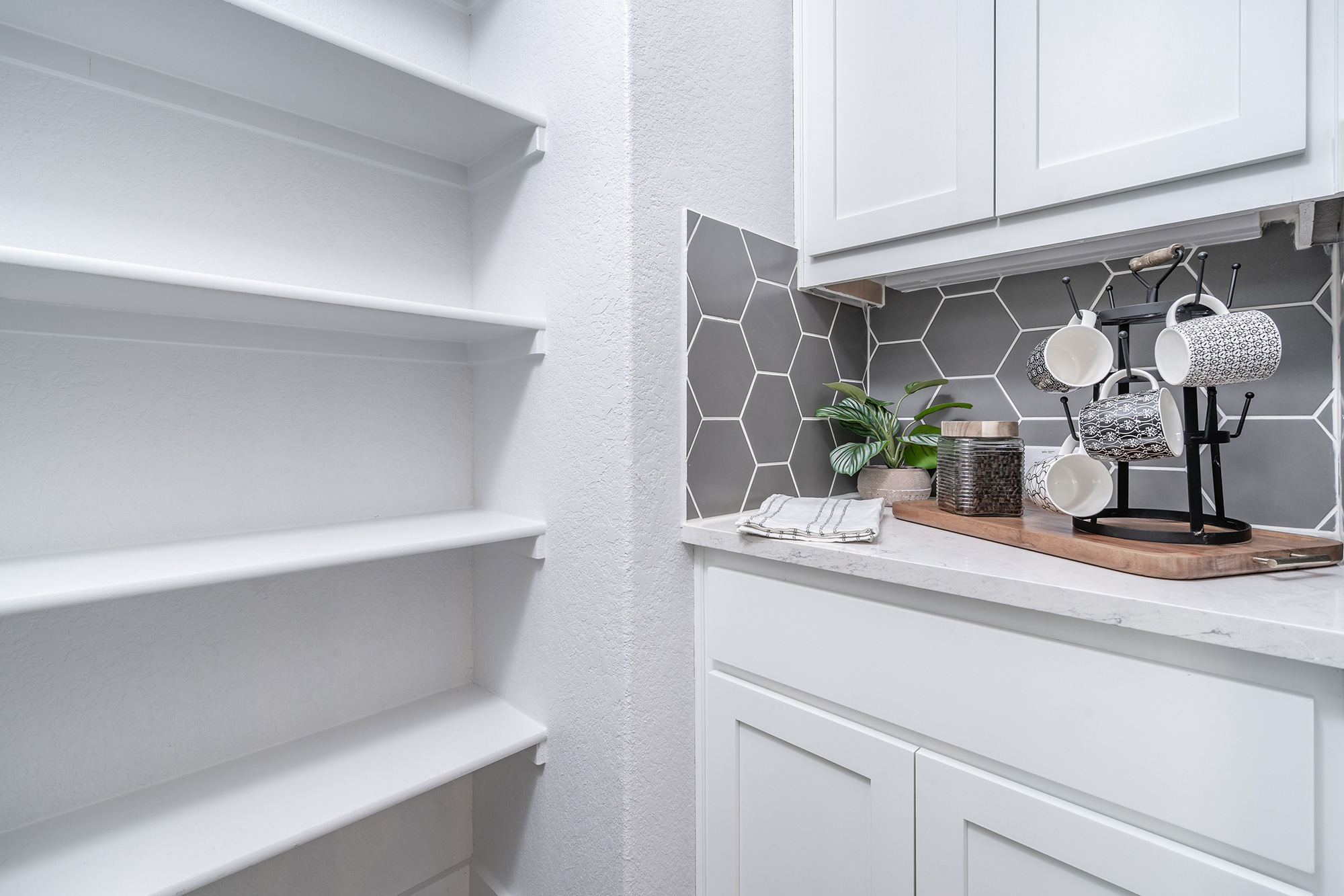 120 Diamondback Drive Georgetown, TX 78628 - Photo 21 of 39 a kitchen with a sink and cabinets