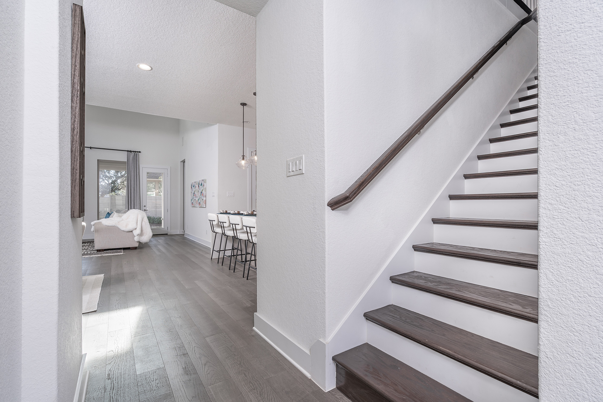 120 Diamondback Drive Georgetown, TX 78628 - Photo 29 of 39 a living room with furniture and a wooden floor