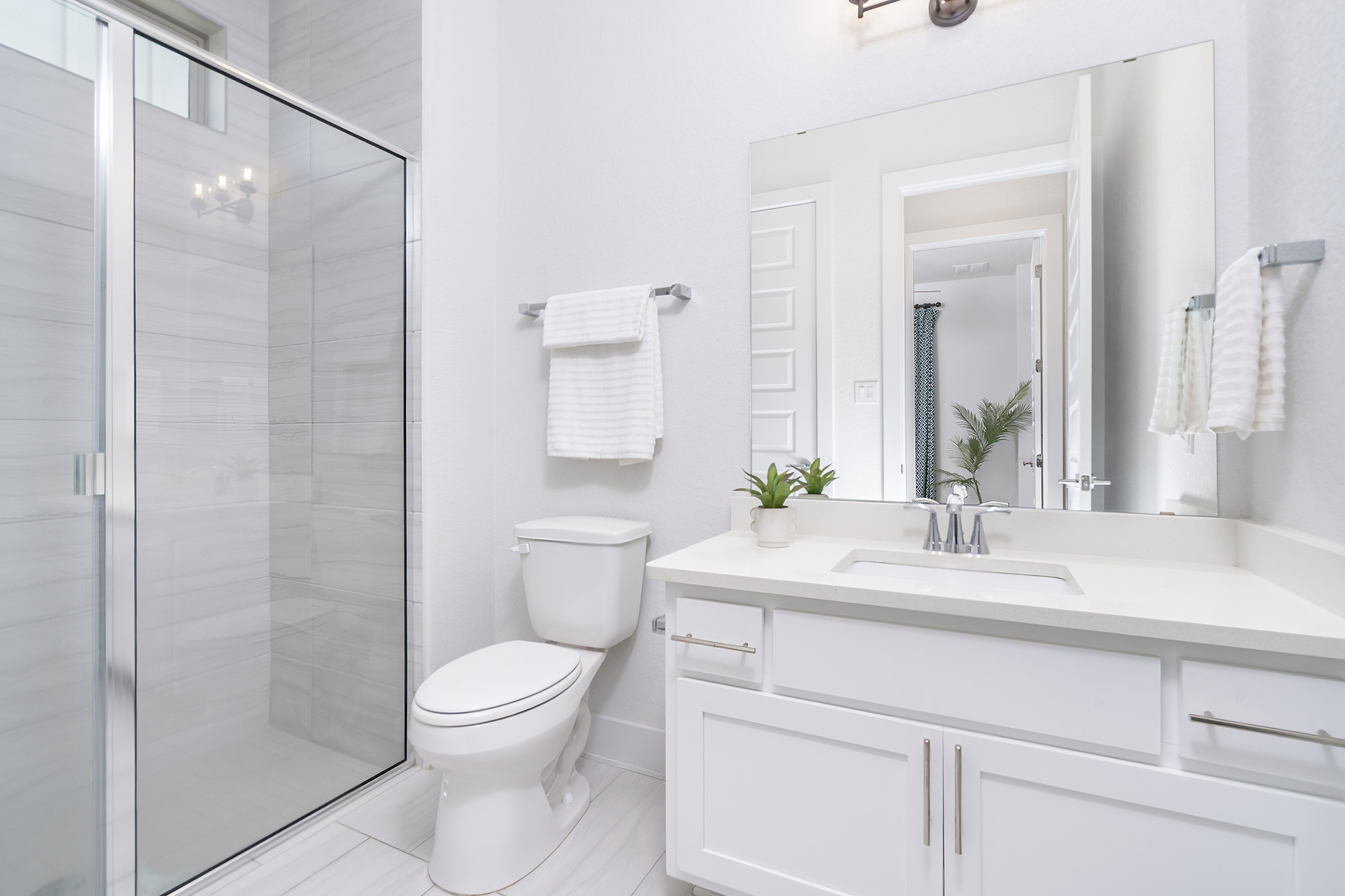120 Diamondback Drive Georgetown, TX 78628 - Photo 7 of 39 a bathroom with a toilet a sink and a mirror