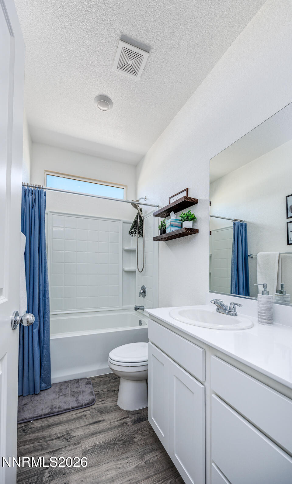 1049 Tamarack Court Fallon, NV 89406 - Photo 11 of 27 a bathroom with a sink toilet and shower