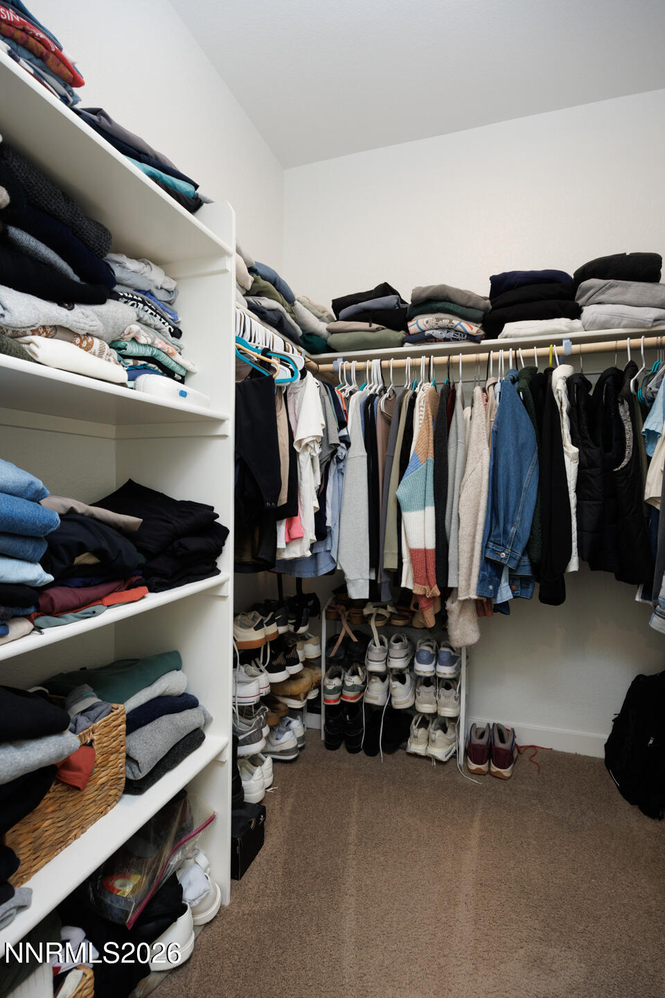 1049 Tamarack Court Fallon, NV 89406 - Photo 16 of 27 a view of walk in closet with clothes and shoes