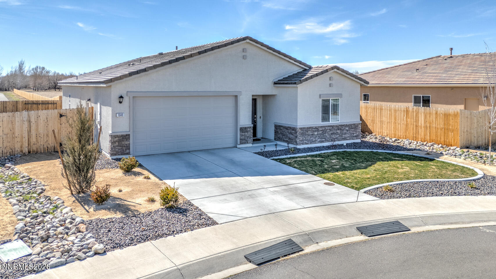 1049 Tamarack Court Fallon, NV 89406 - Photo 2 of 27 a view of a house with backyard