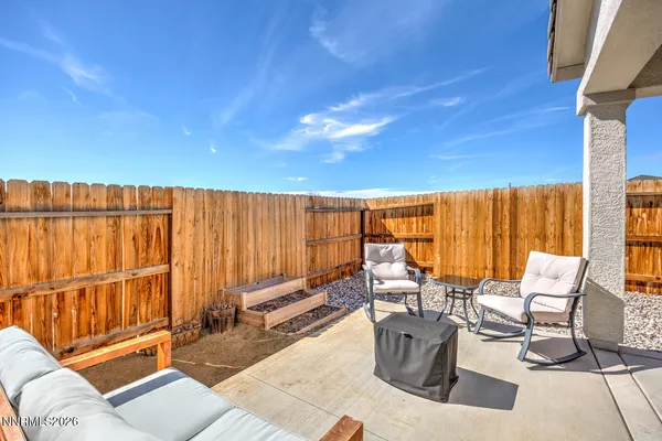 an aerial view of a house with outdoor space