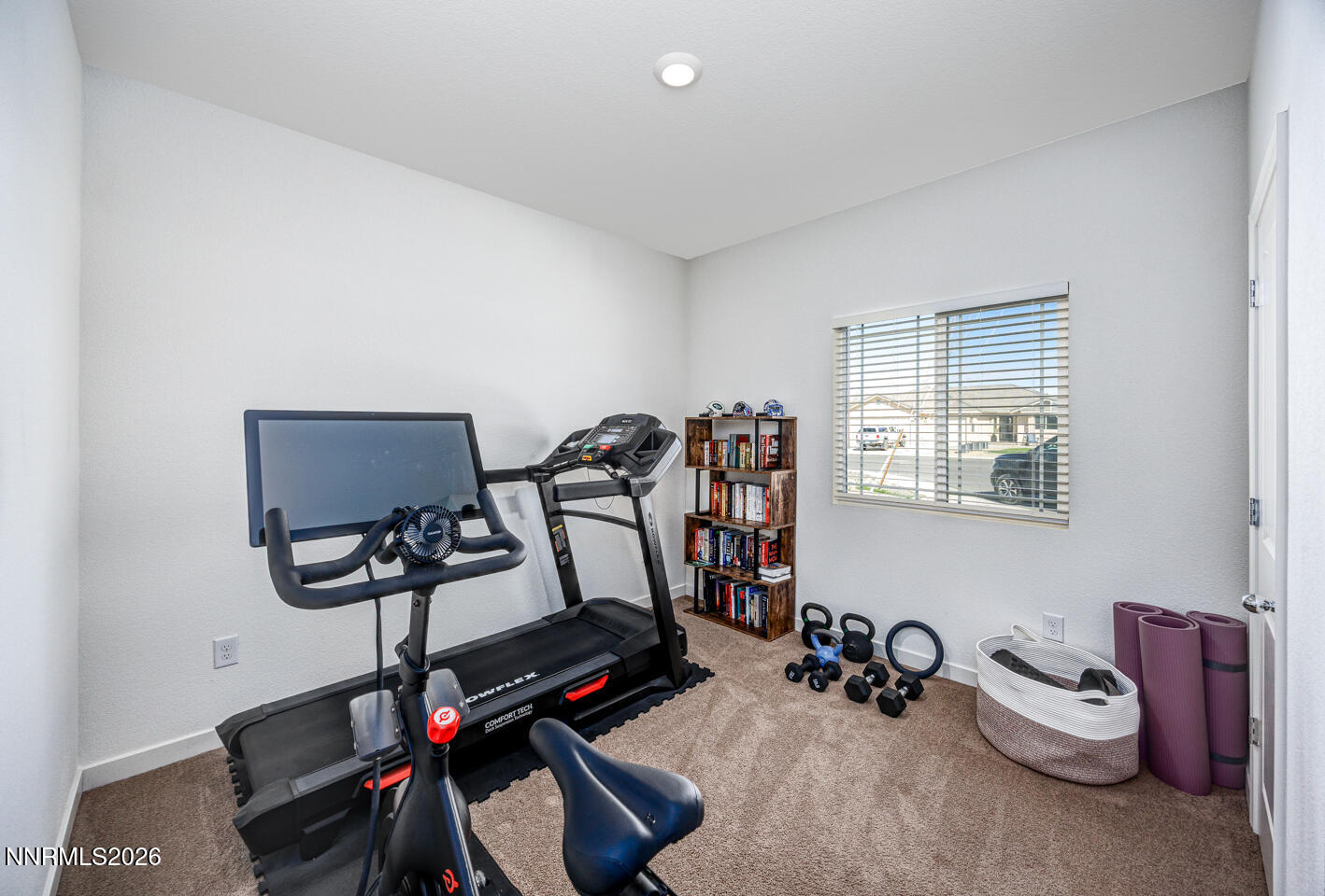 1049 Tamarack Court Fallon, NV 89406 - Photo 10 of 27 a view of a room with gym equipment