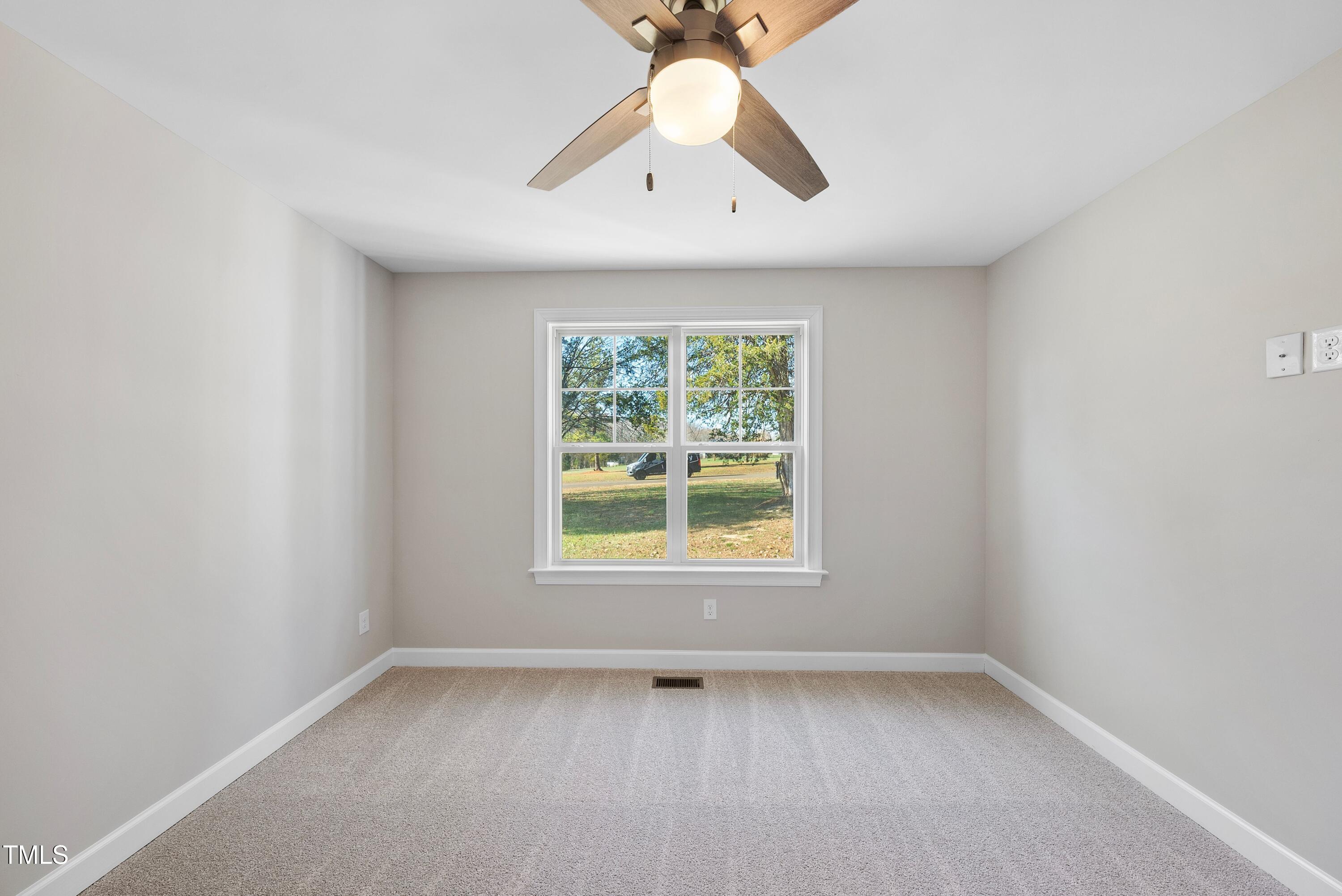 9425 Meredith Drive Rougemont, NC 27572 - Photo 20 of 29 an empty room with a window