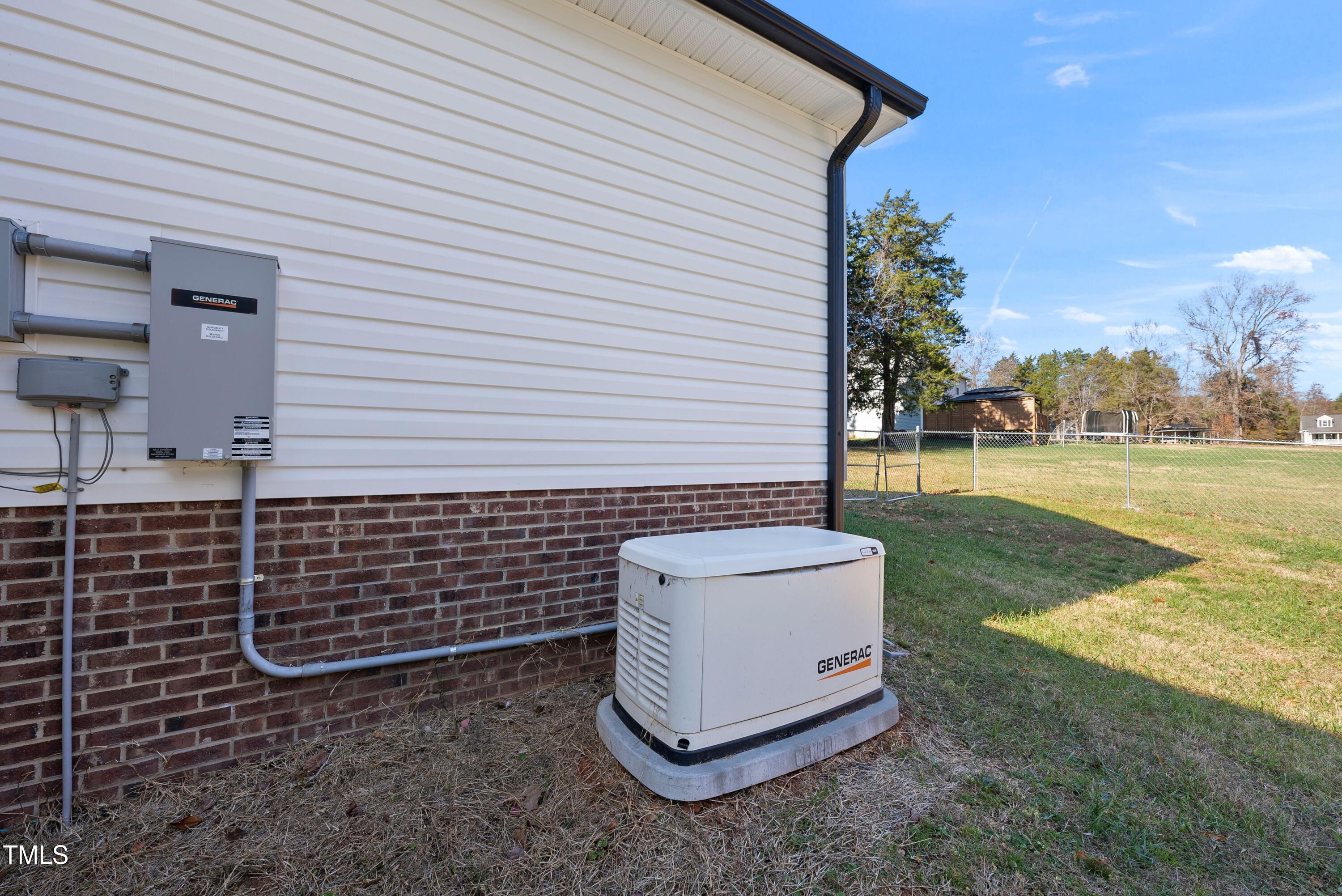 9425 Meredith Drive Rougemont, NC 27572 - Photo 25 of 29 a view of a backyard with grass and plants