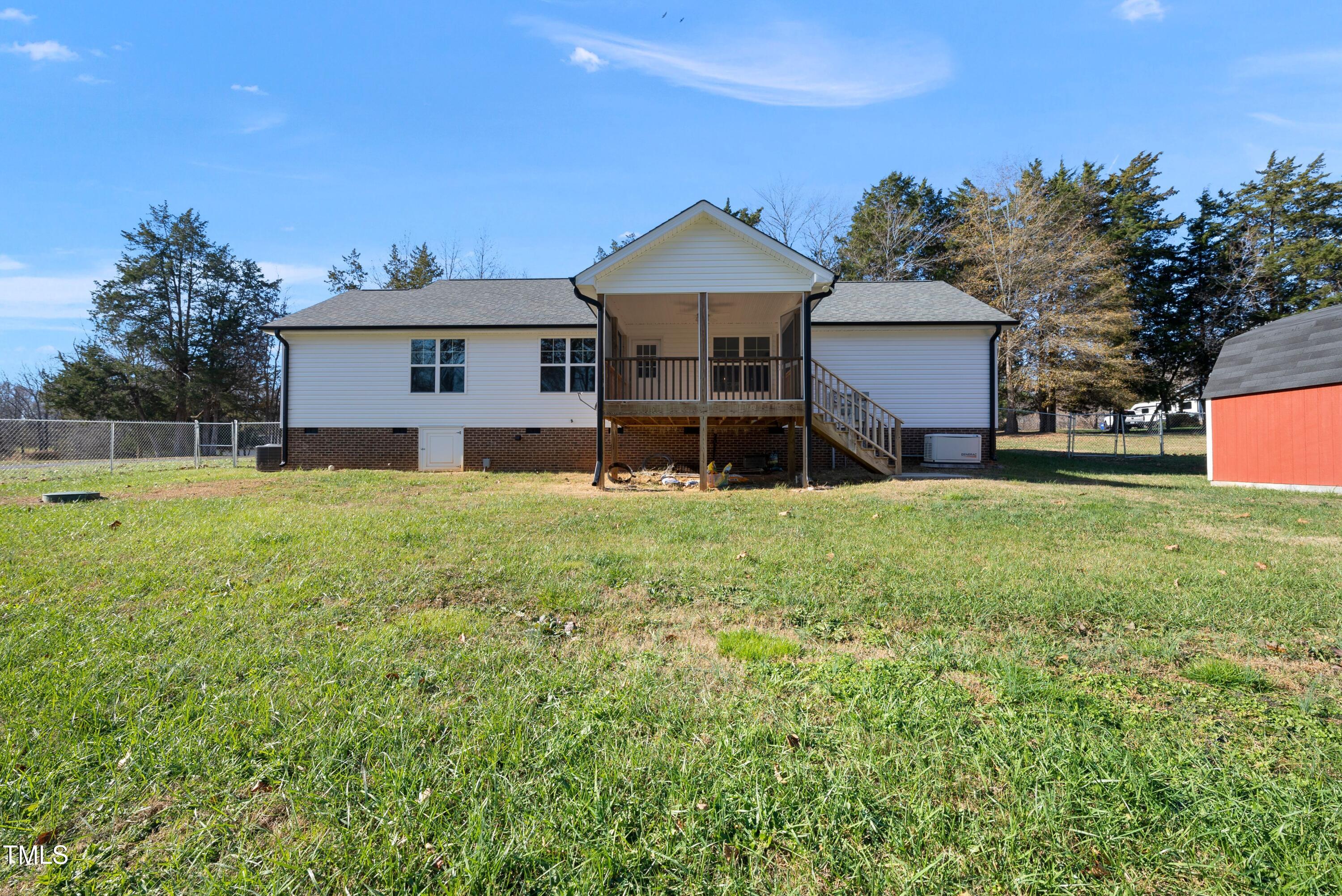 9425 Meredith Drive Rougemont, NC 27572 - Photo 27 of 29 a view of a house with a yard and sitting area