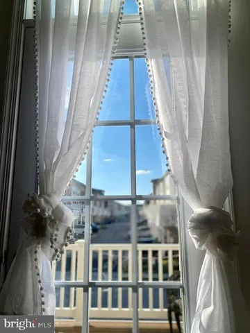 a view of balcony with wooden floor