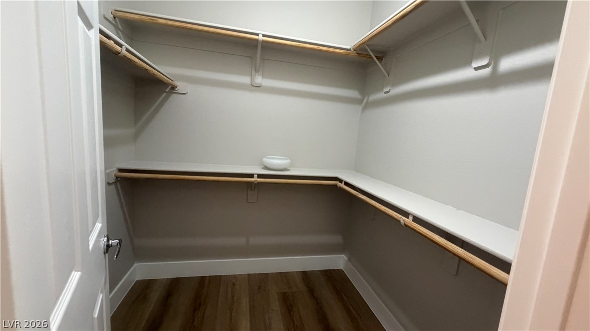 9453 Alma Ridge Avenue Las Vegas, NV 89178 - Photo 11 of 25 Ample shelving and hanging space defines this well-organized walk-in closet.