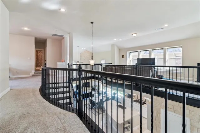 a view of a porch with wooden floor