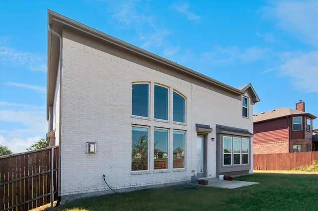 a house view with a garden space