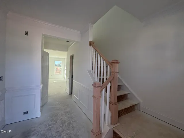 a view of multiple houses with a street