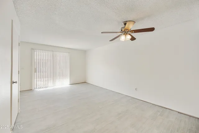 a view of a kitchen with a sink and cabinet area