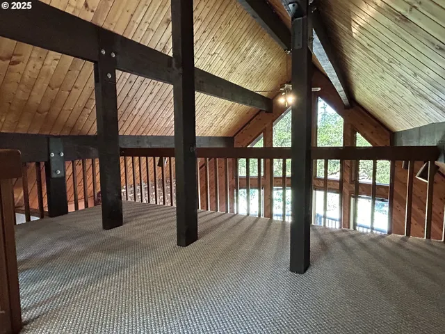a view of a livingroom with wooden floor