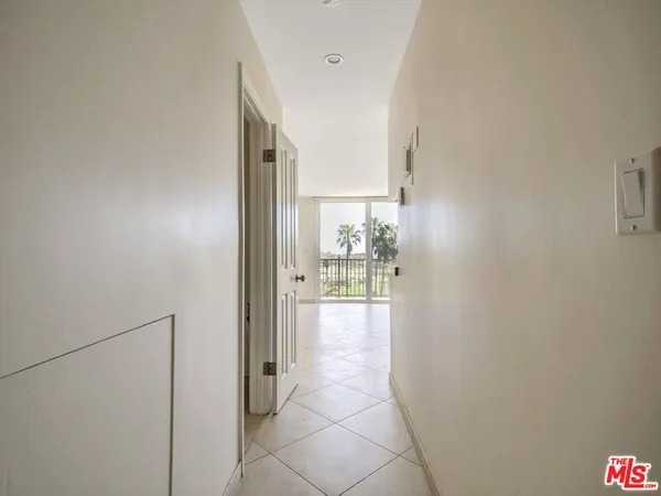 a view of a room with sliding glass door