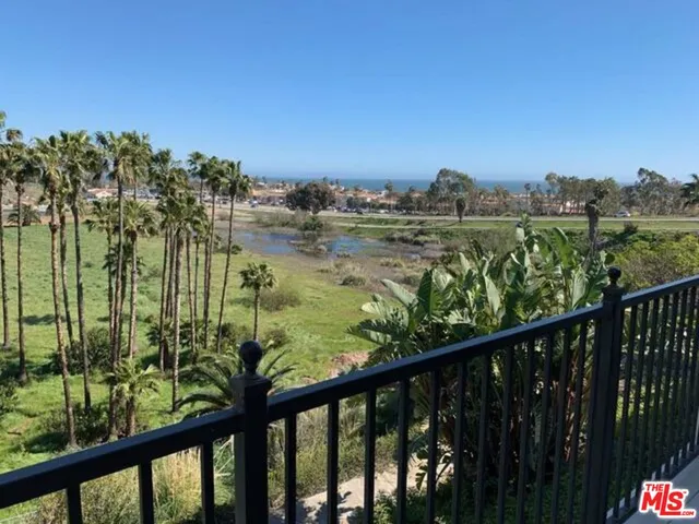 a view of a lake from a balcony