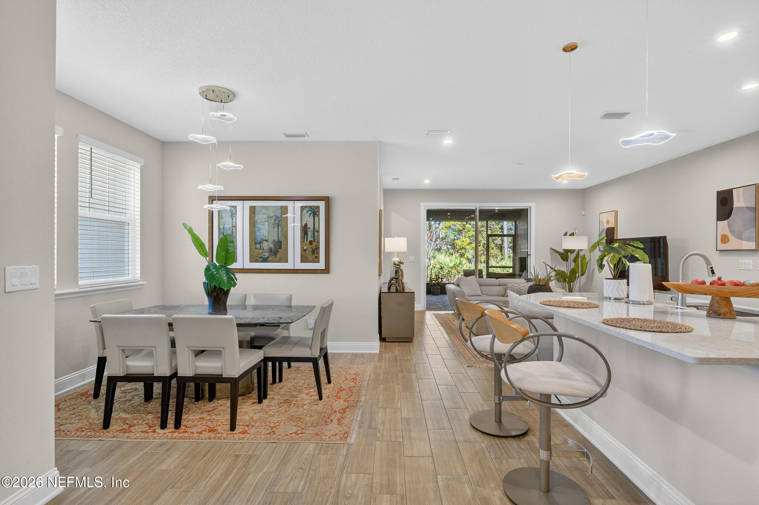 59 Fly Line Drive St. Johns, FL 32259 - Photo 12 of 60 a view of a dining room with furniture window and wooden floor