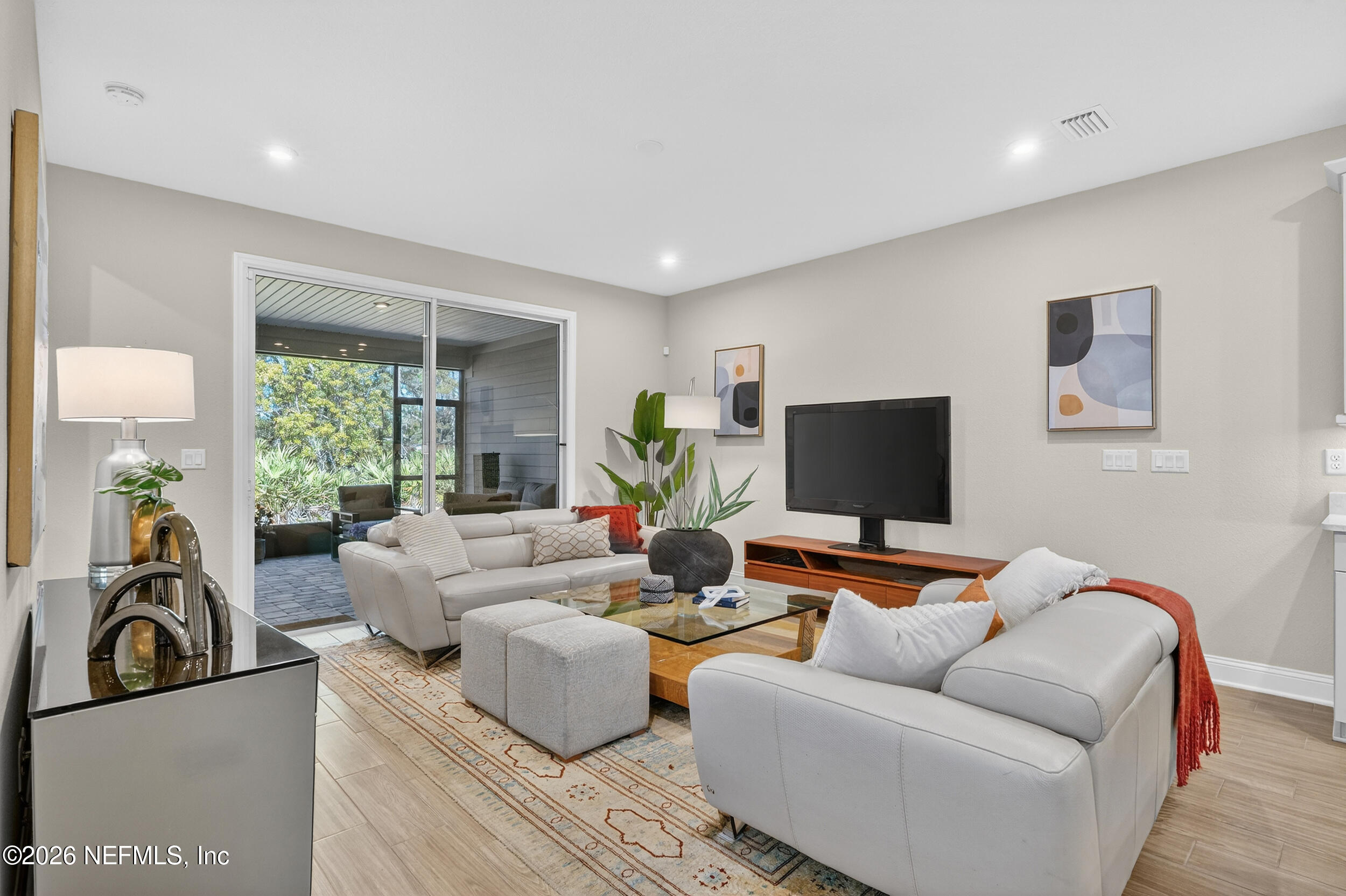 59 Fly Line Drive St. Johns, FL 32259 - Photo 16 of 60 a living room with furniture and a flat screen tv