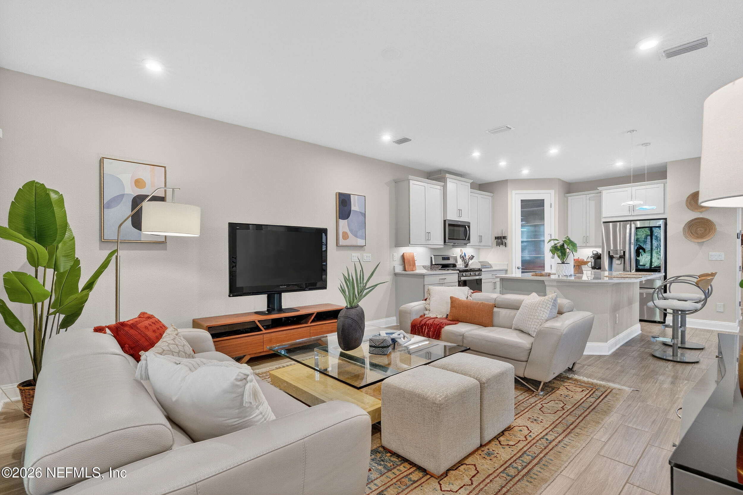 59 Fly Line Drive St. Johns, FL 32259 - Photo 17 of 60 a living room with furniture and a flat screen tv