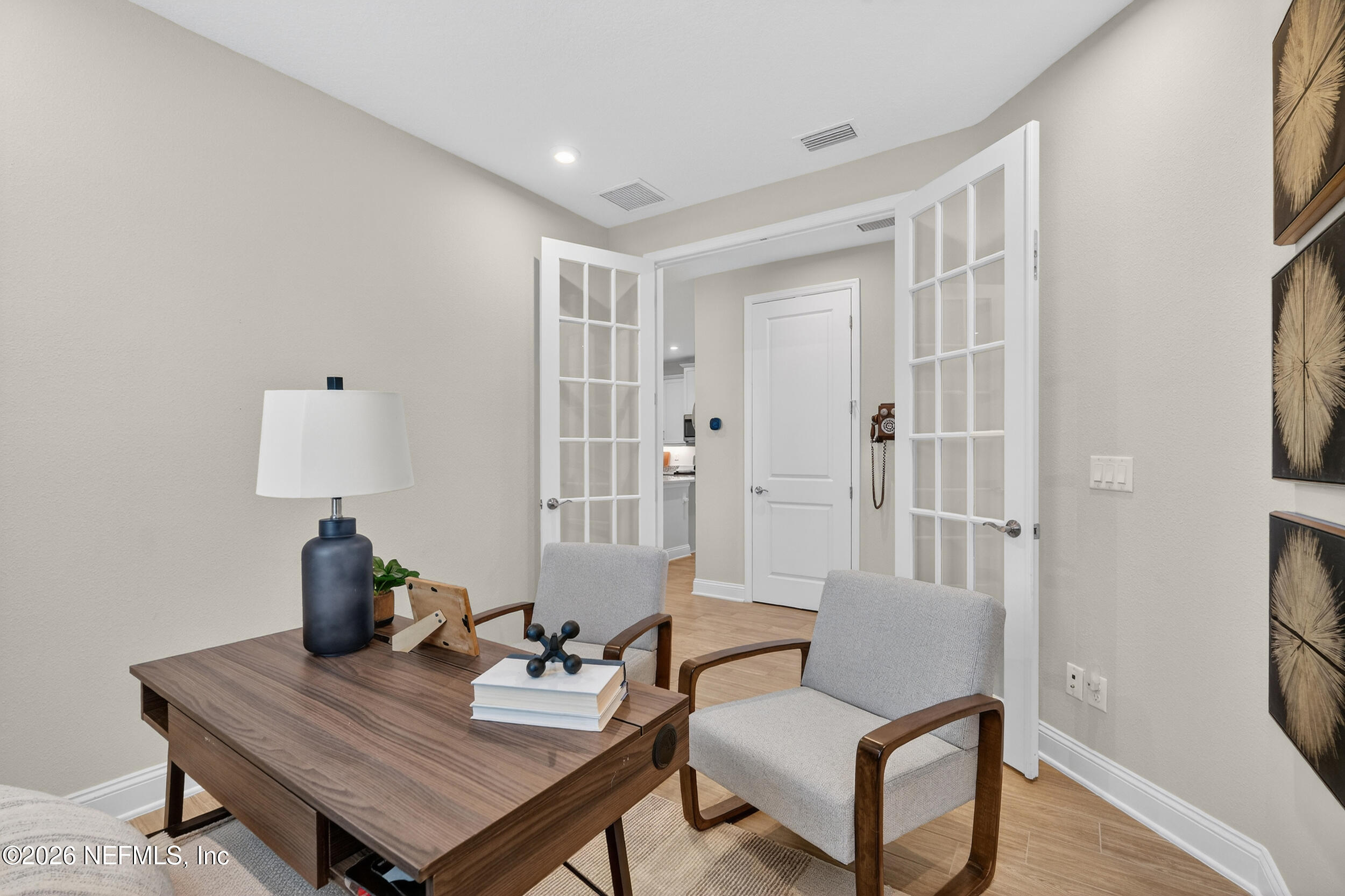 59 Fly Line Drive St. Johns, FL 32259 - Photo 26 of 60 a view of a livingroom with furniture and wooden floor