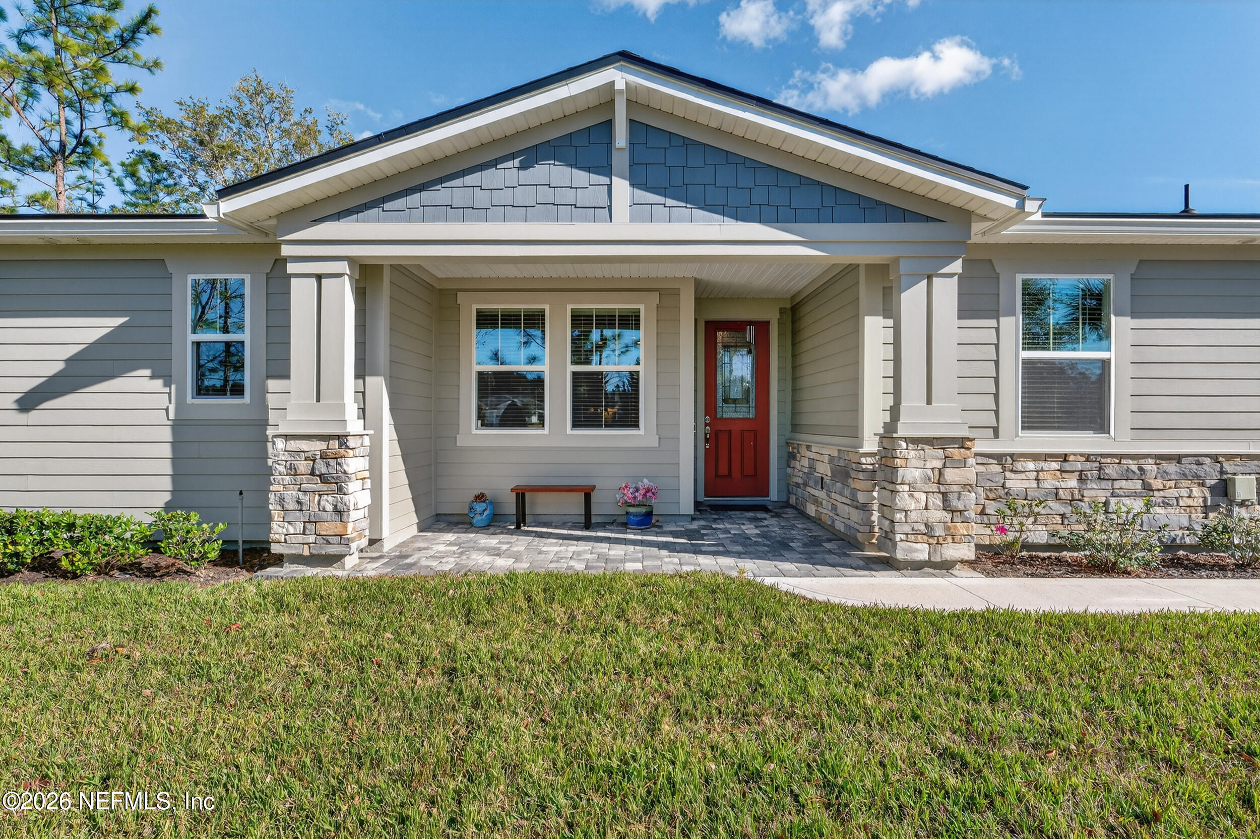 59 Fly Line Drive St. Johns, FL 32259 - Photo 3 of 60 front view of a house with a yard