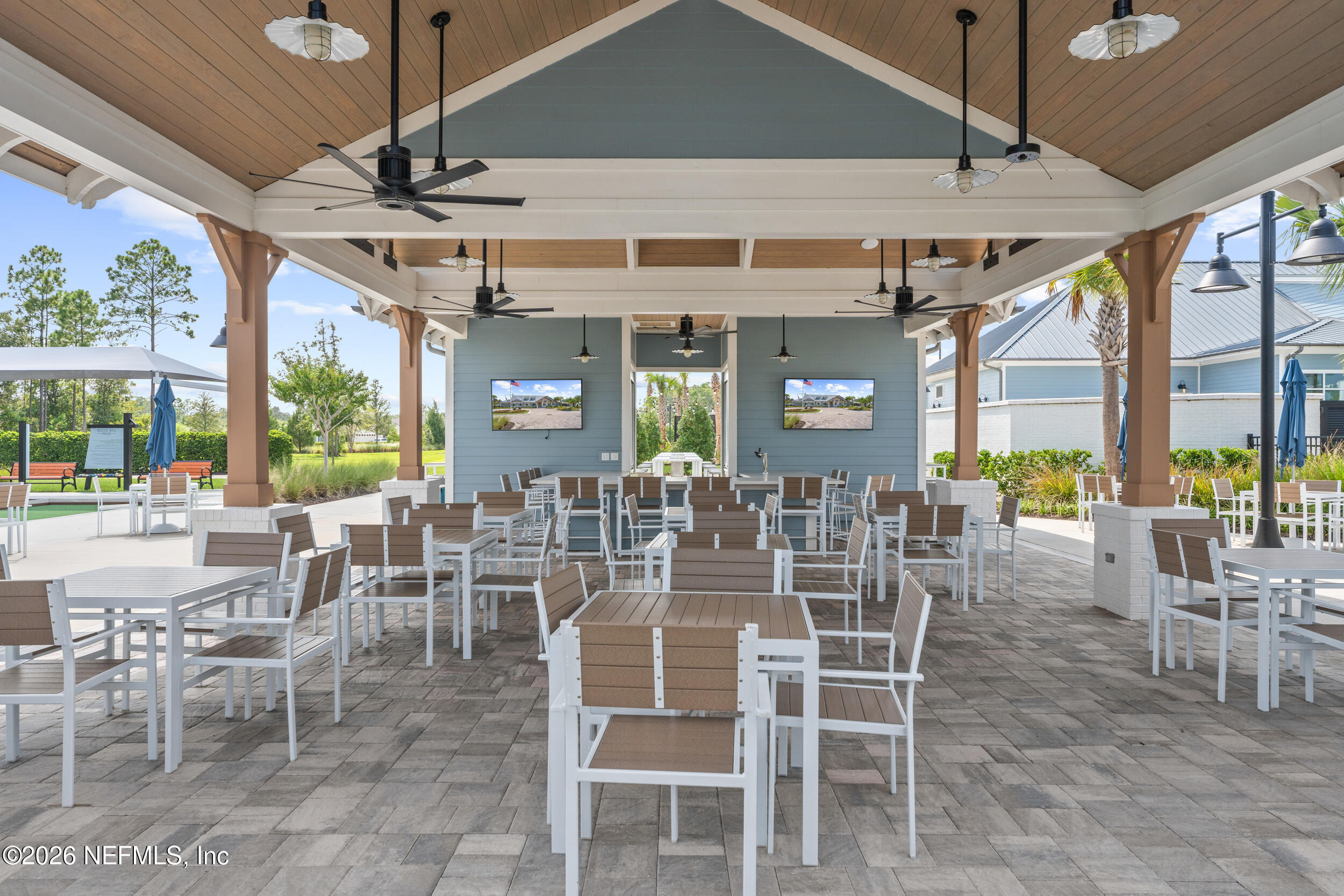 59 Fly Line Drive St. Johns, FL 32259 - Photo 53 of 60 a view of a dining room with furniture wooden floor and chandelier