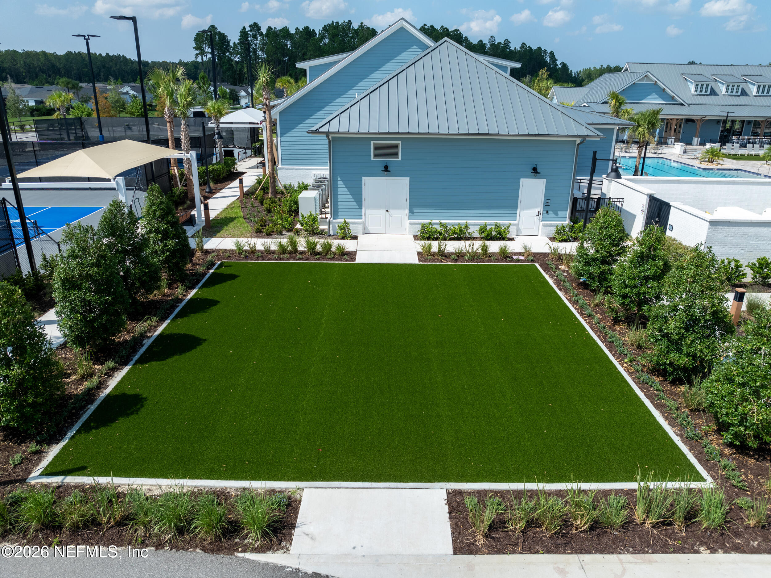 59 Fly Line Drive St. Johns, FL 32259 - Photo 57 of 60 a front view of house with yard and green space