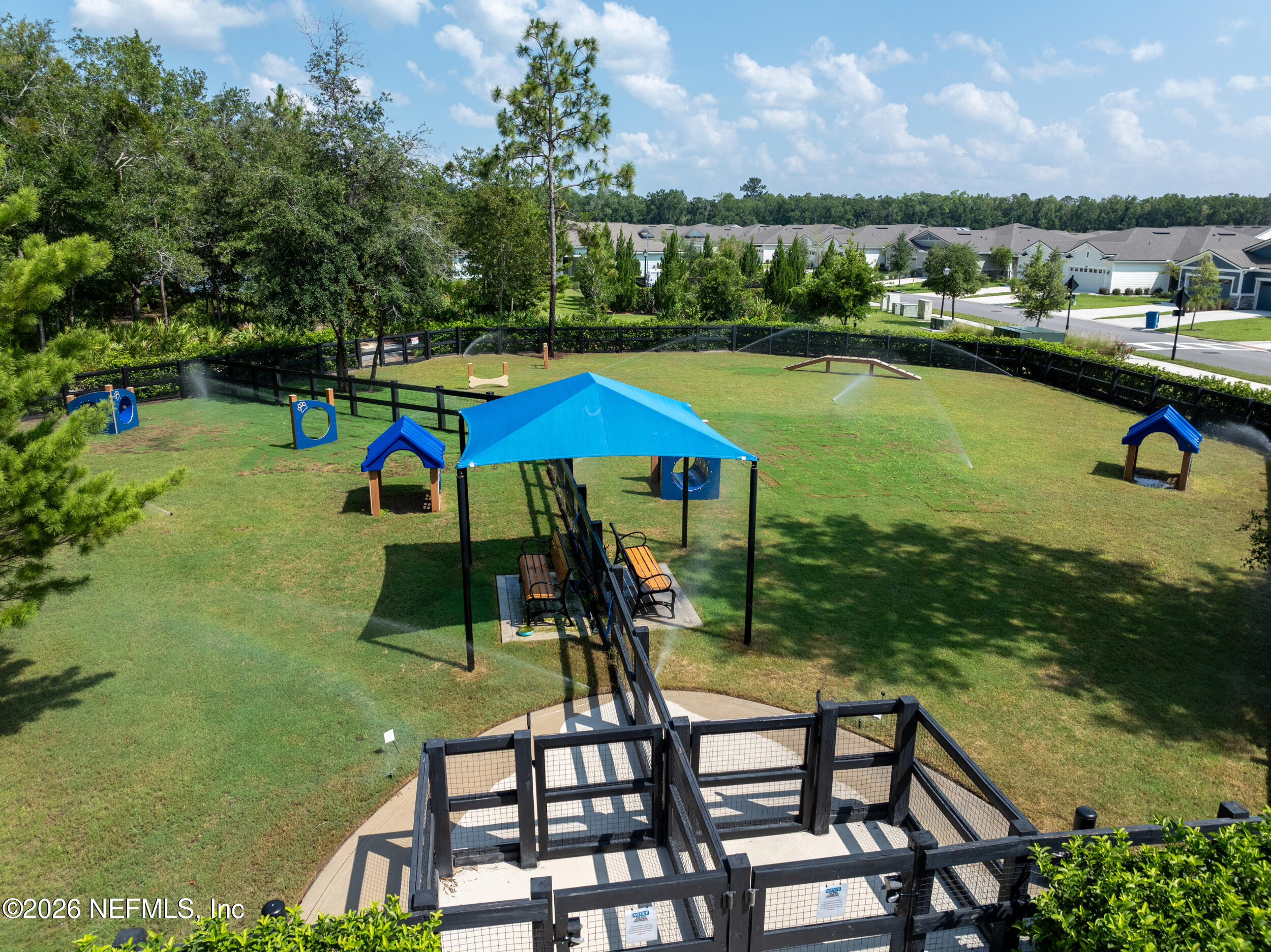 59 Fly Line Drive St. Johns, FL 32259 - Photo 58 of 60 a view of swimming pool with outdoor seating and garden