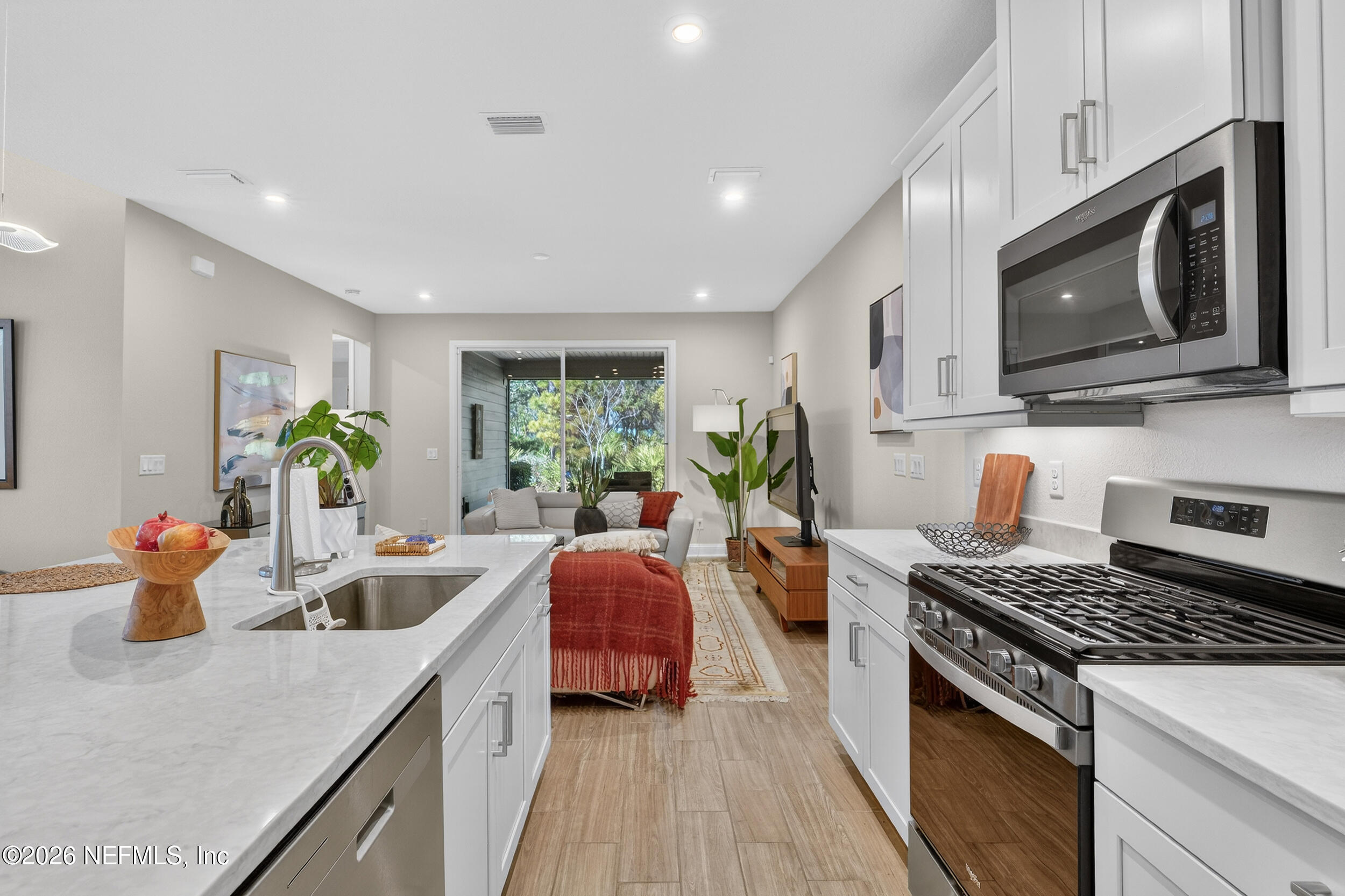 59 Fly Line Drive St. Johns, FL 32259 - Photo 6 of 60 a kitchen with a stove and a sink