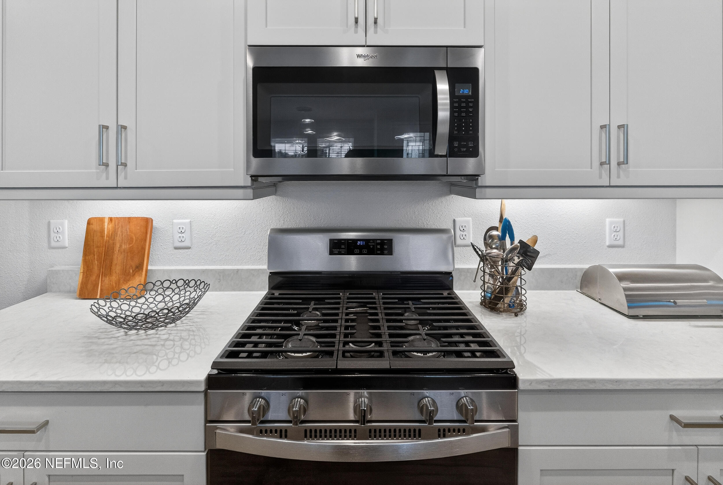 59 Fly Line Drive St. Johns, FL 32259 - Photo 7 of 60 a kitchen with granite countertop stainless steel appliances stove and cabinets