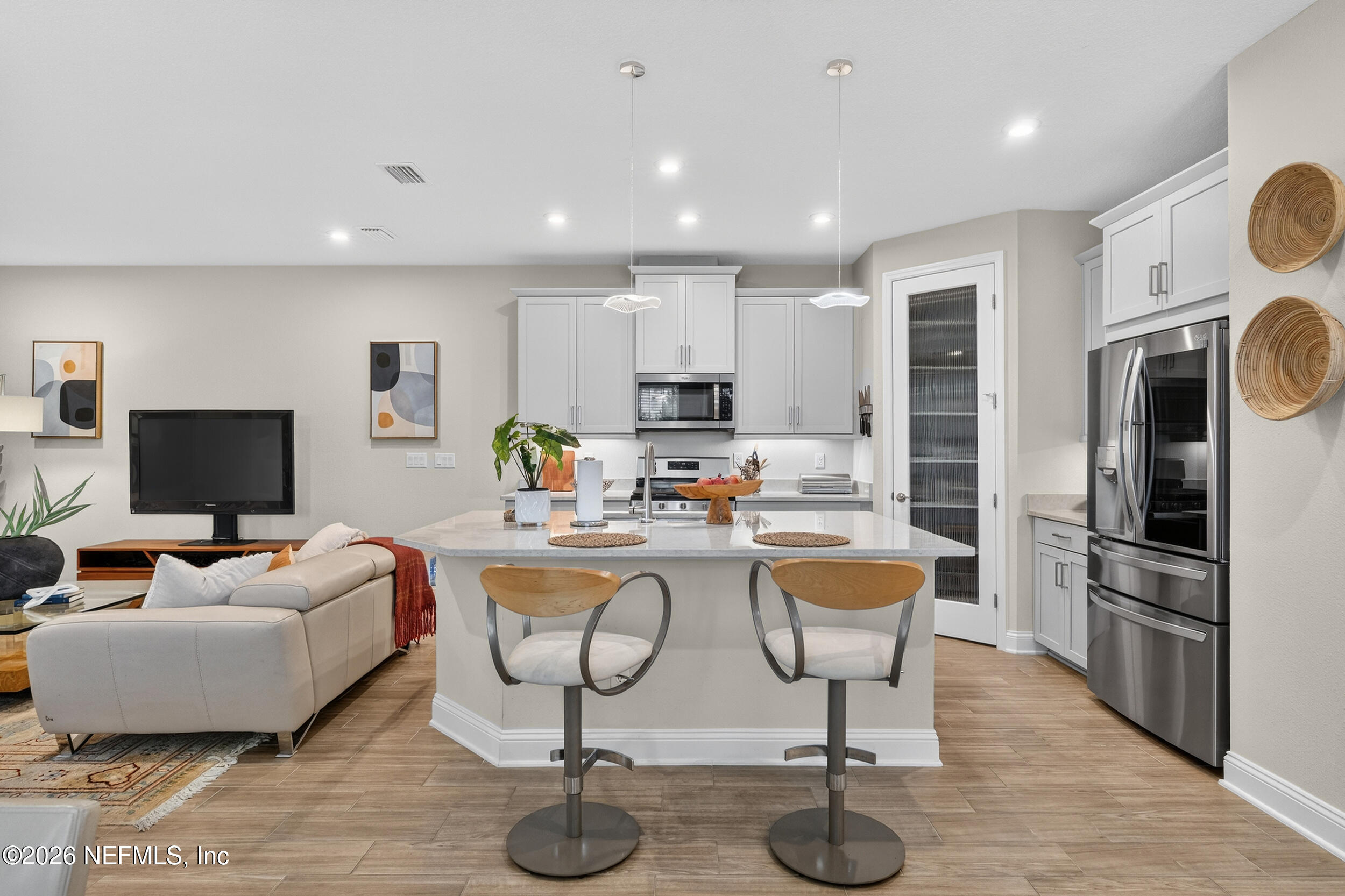59 Fly Line Drive St. Johns, FL 32259 - Photo 10 of 60 a living room with stainless steel appliances furniture and a kitchen view