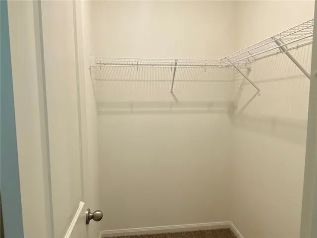 a view of small space with racks on the wall