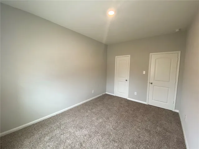 an empty room with an entryway