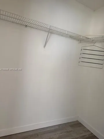 a view of a room with racks on the wall