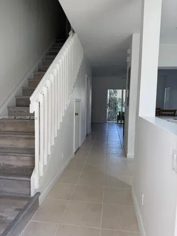 a view of hallway with stairs