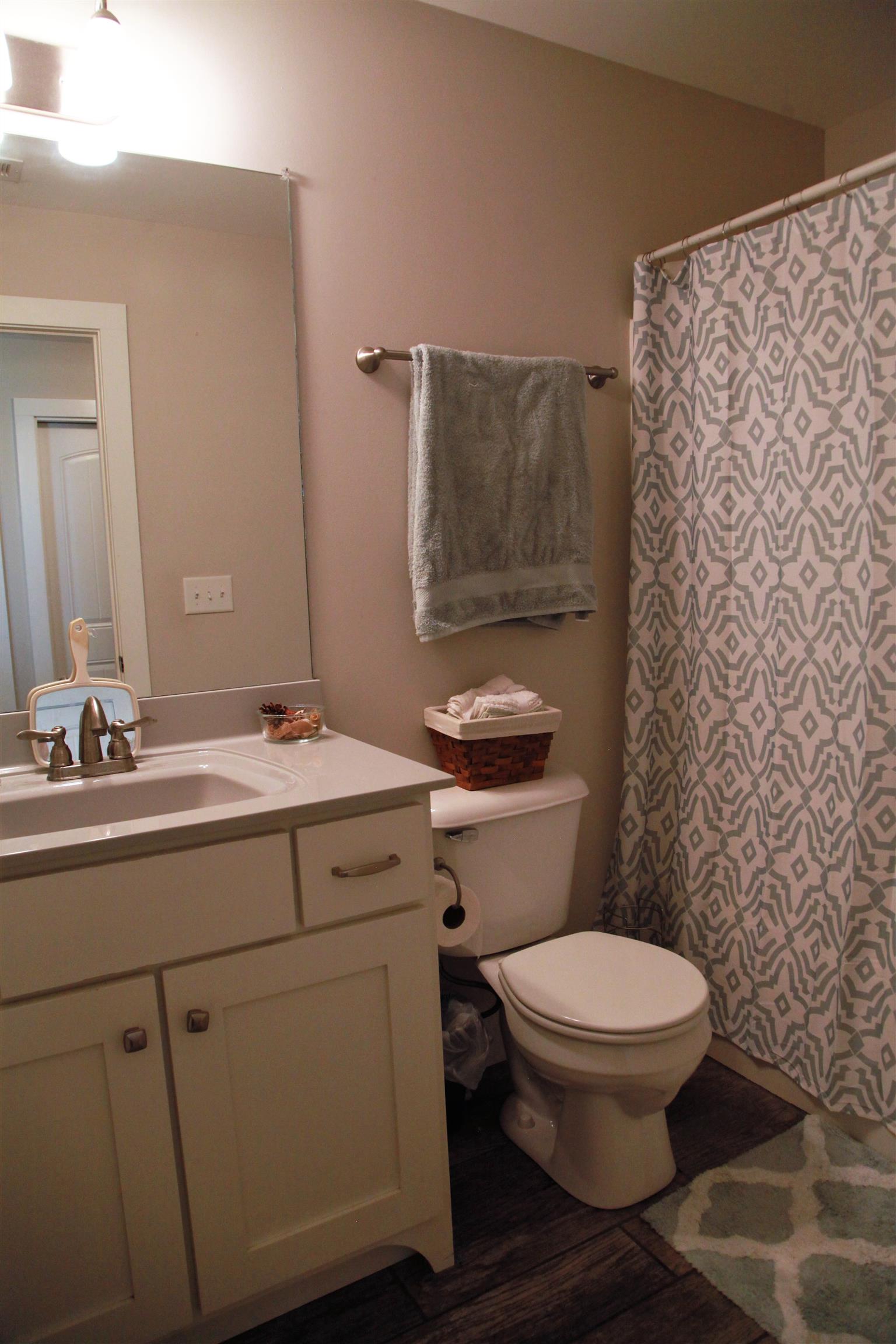 1013 Ridge Trail Goodlettsville, TN 37072 - Photo 17 of 17 a bathroom with a toilet sink and mirror