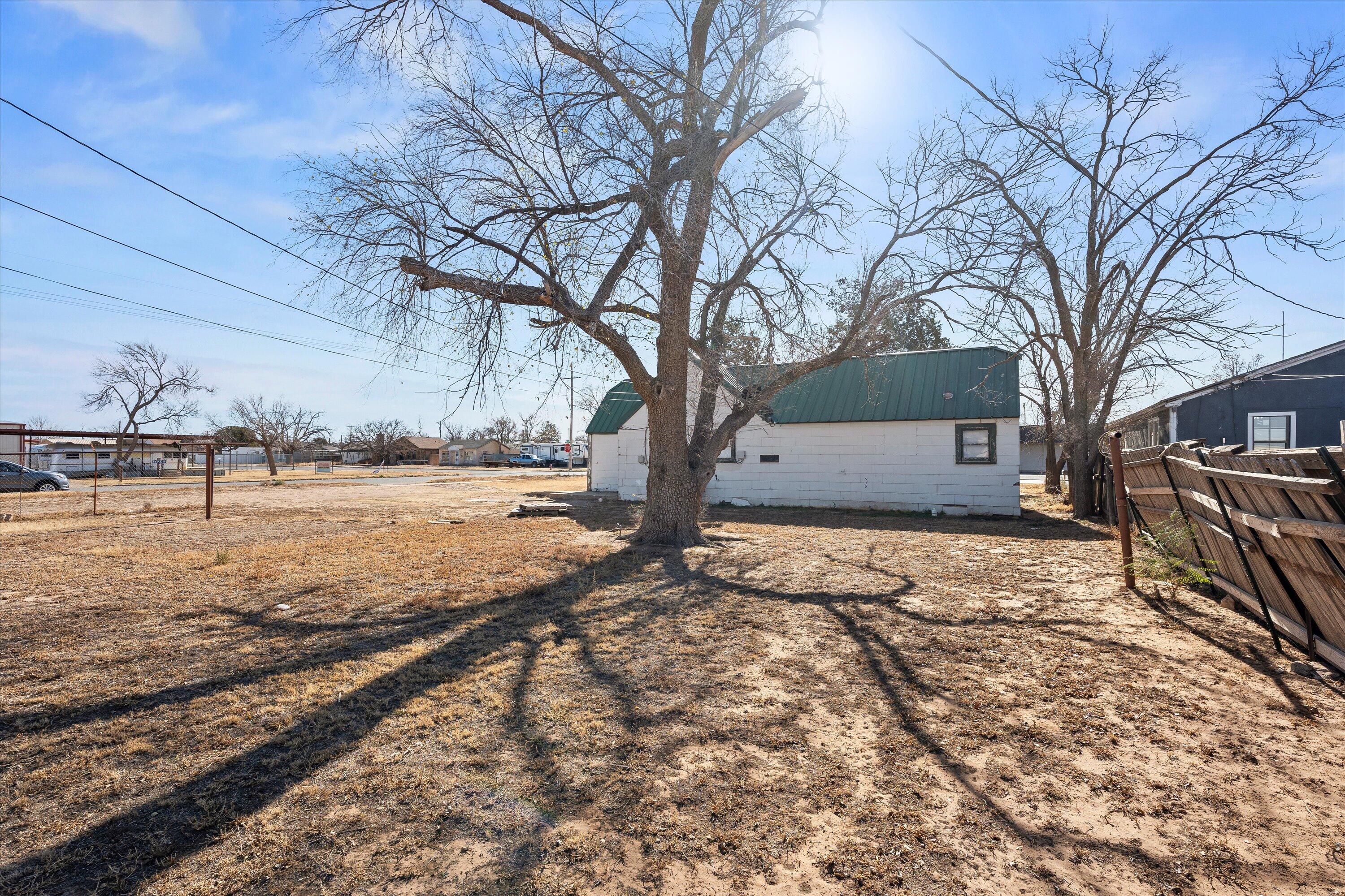 301 Austin Street Levelland, TX 79336 - Photo 18 of 18 a view of a yard with snow on the road