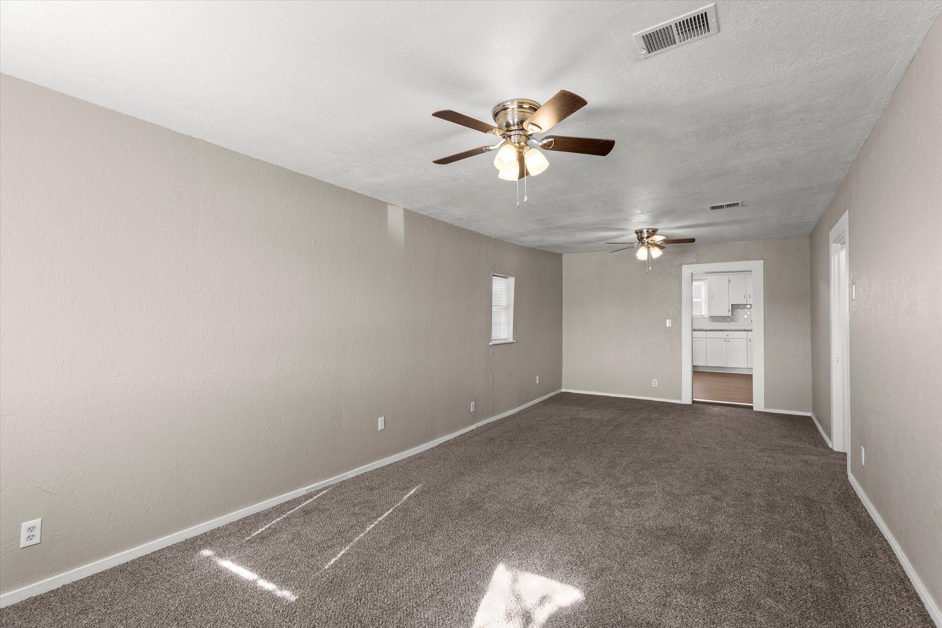301 Austin Street Levelland, TX 79336 - Photo 3 of 18 a view of an empty room