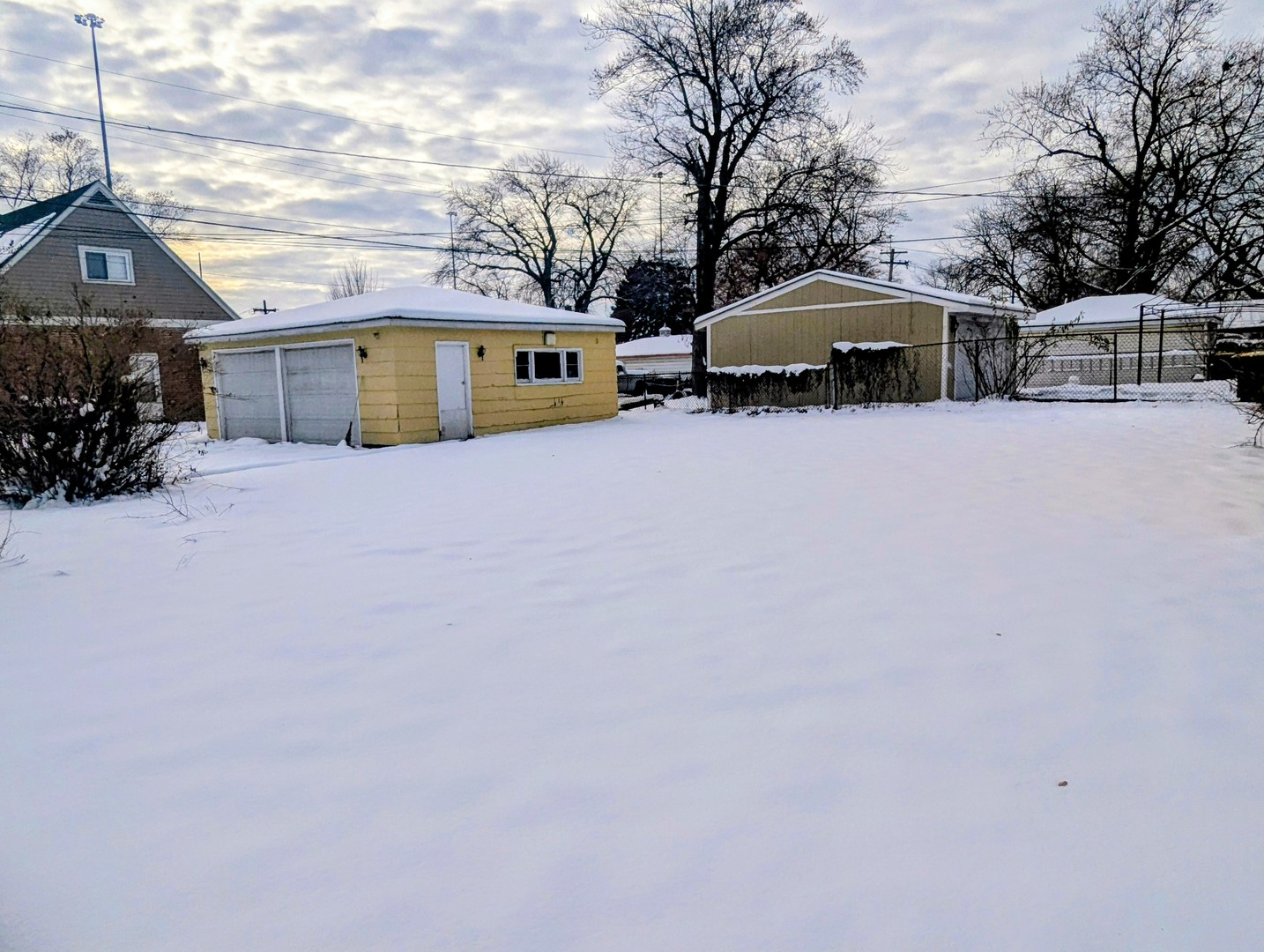 3253 Bernice Road Lansing, IL 60438 - Photo 20 of 20 a car parked in front of house