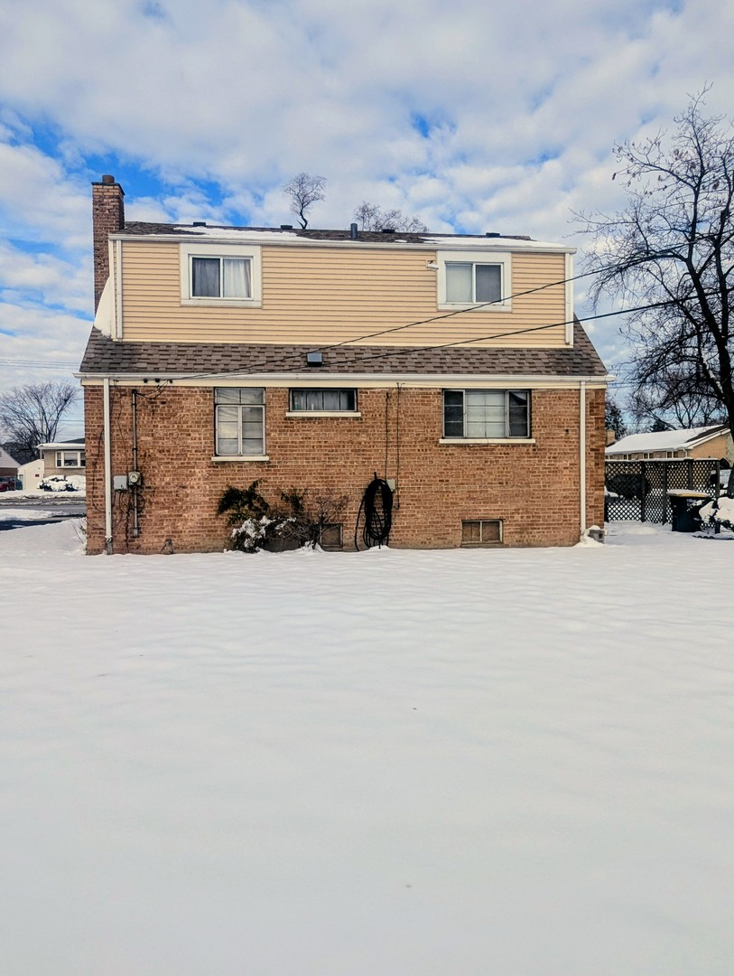 3253 Bernice Road Lansing, IL 60438 - Photo 2 of 20 a front view of a house with a yard