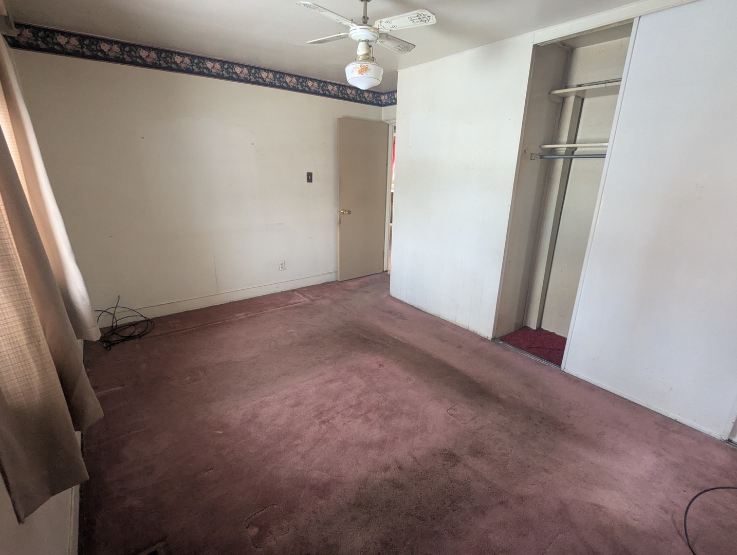 3253 Bernice Road Lansing, IL 60438 - Photo 9 of 20 a view of a room with racks on the wall