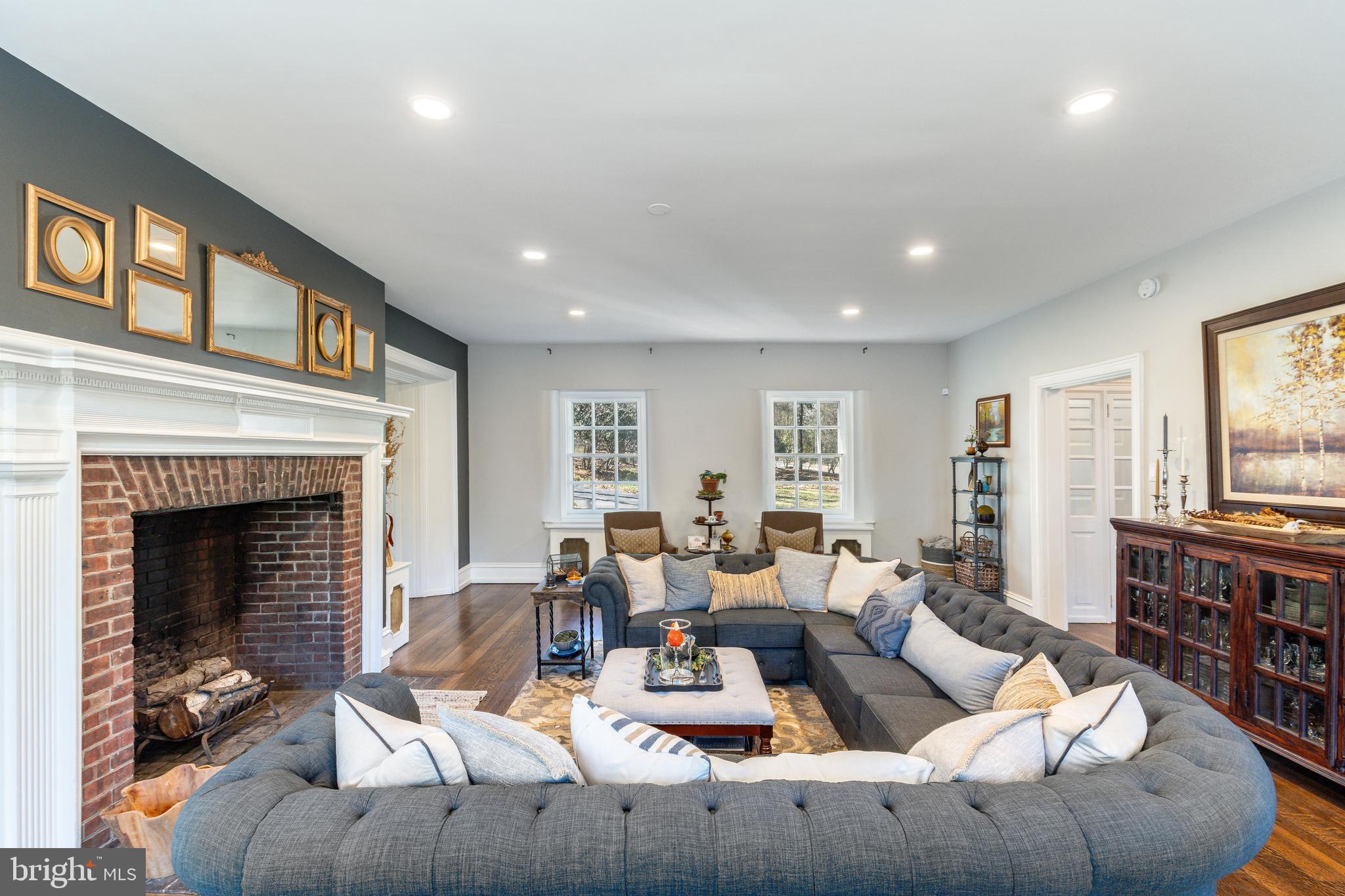 710 Weadley Road Radnor, PA 19087 - Photo 35 of 67 a living room with furniture and a fireplace