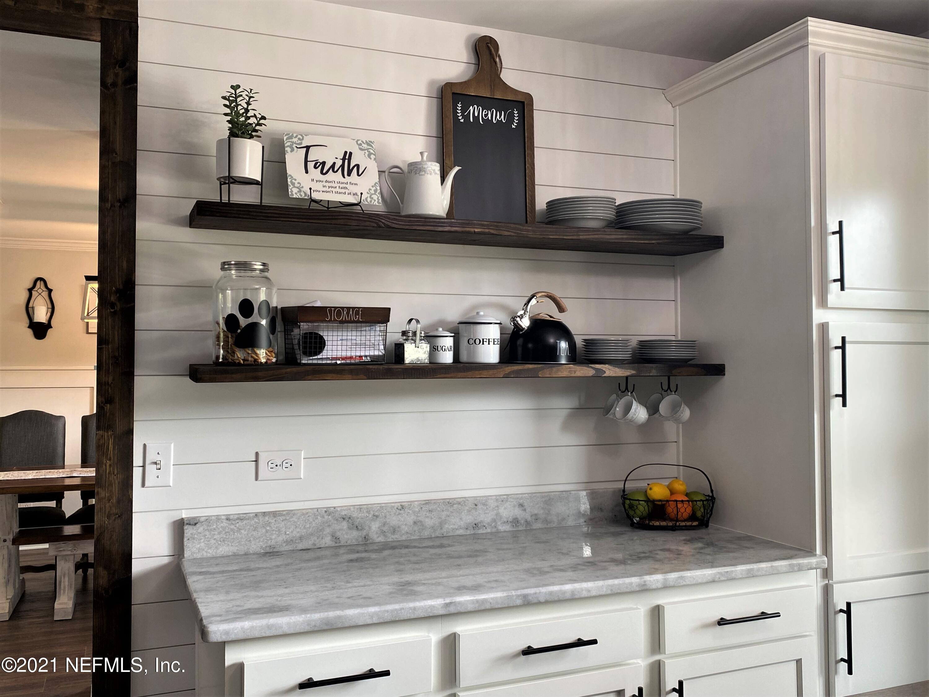 2801 Orange Picker Road Jacksonville, FL 32223 - Photo 9 of 25 kitchen shelves 2