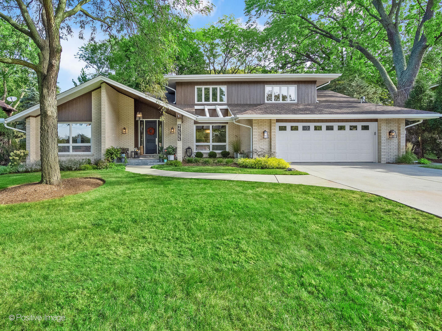 6555 Shabbona Road Indian Head Park, IL 60525 - Photo 1 of 63 a view of a house with a yard and sitting area