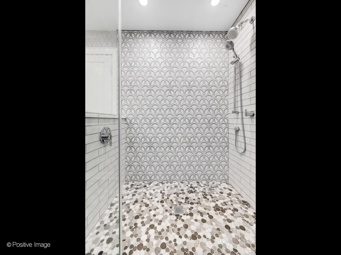 6555 Shabbona Road Indian Head Park, IL 60525 - Photo 36 of 63 a bathroom with a shower and a sink