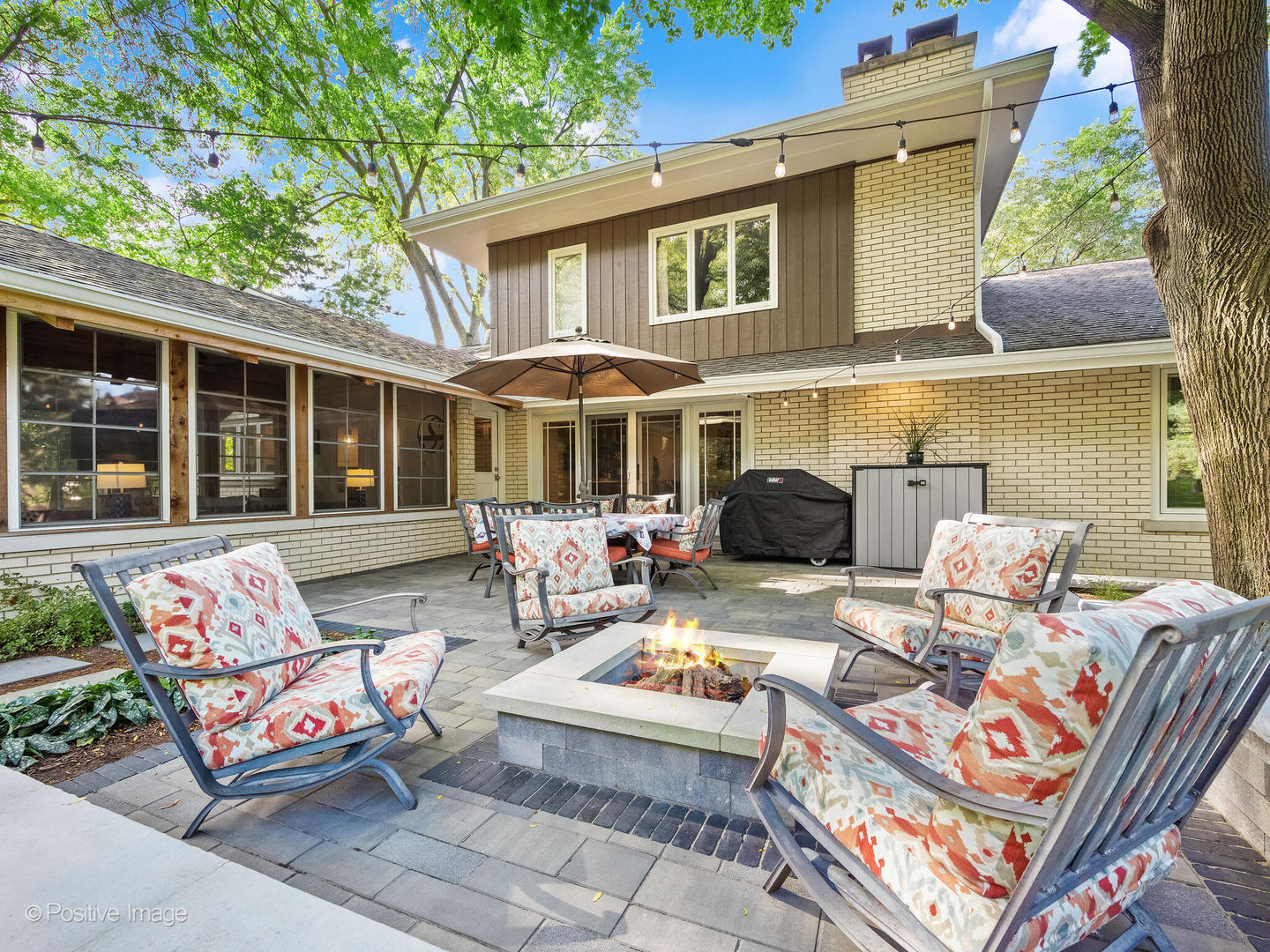 6555 Shabbona Road Indian Head Park, IL 60525 - Photo 56 of 63 a view of a patio with a dining table and chairs with two couches