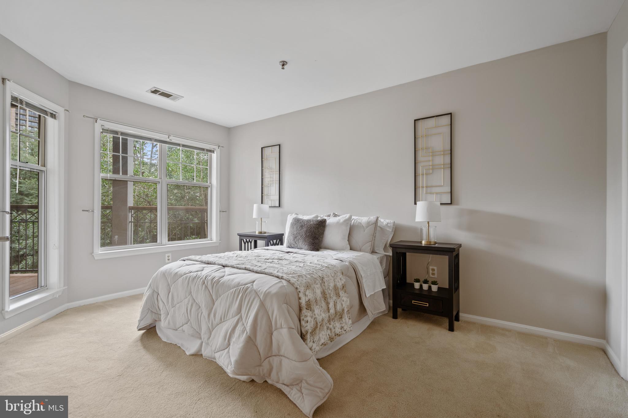 5575 Seminary Road, Unit 316 Falls Church, VA 22041 - Photo 14 of 23 Large guest bedroom with balcony access.