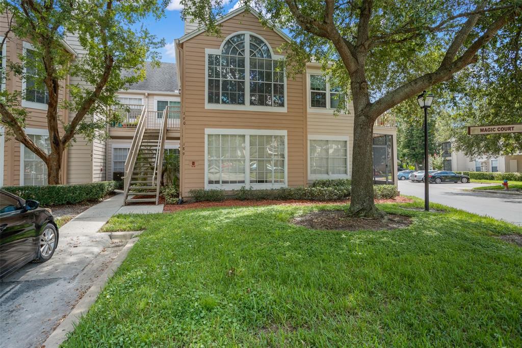 655 Magic Court, Unit 189 Altamonte Springs, FL 32714 - Photo 1 of 1 a front view of a house with a garden