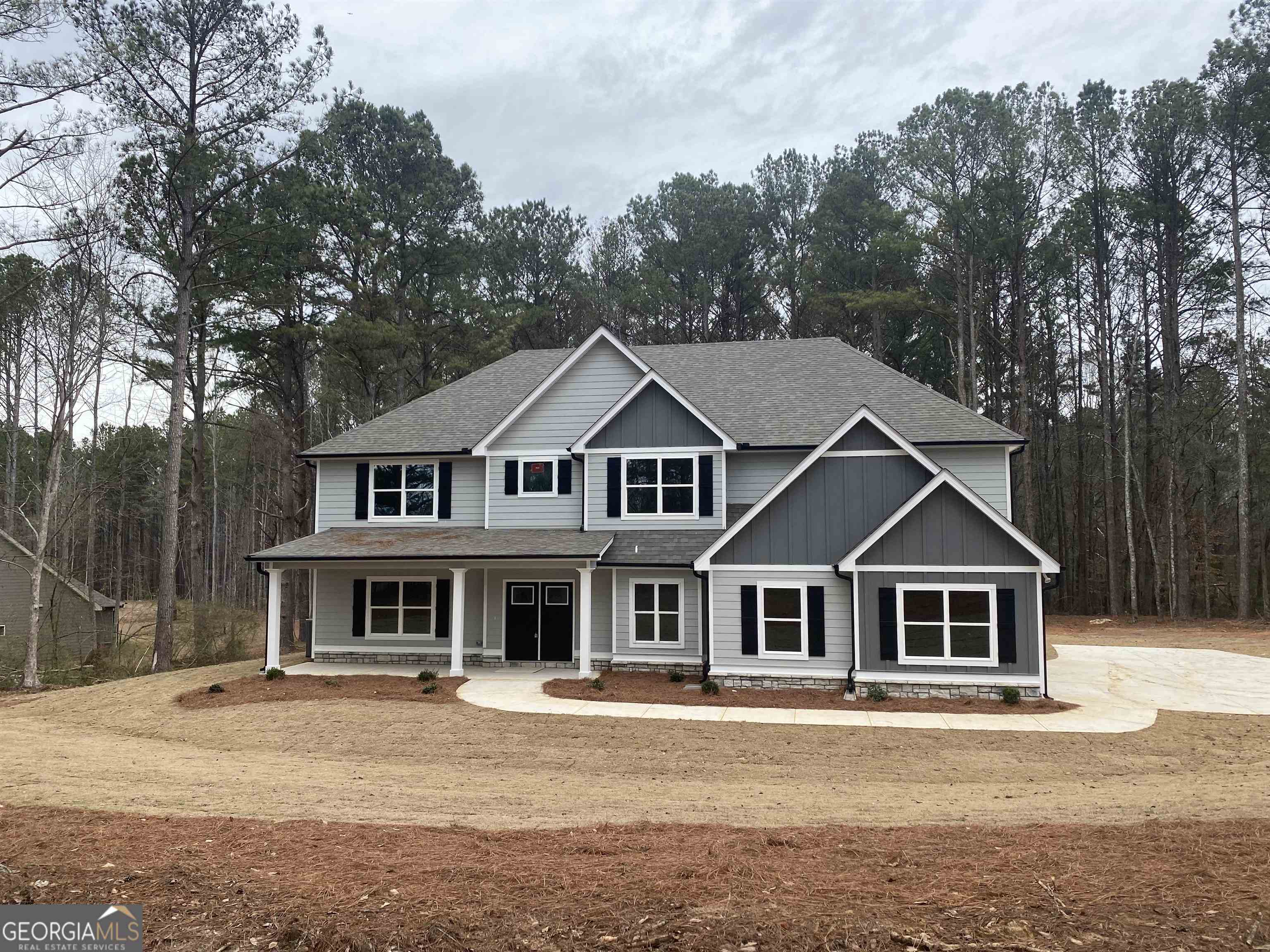 277 Paynes Lake Road Carrollton, GA 30116 - Photo 1 of 1 a front view of a house with a yard