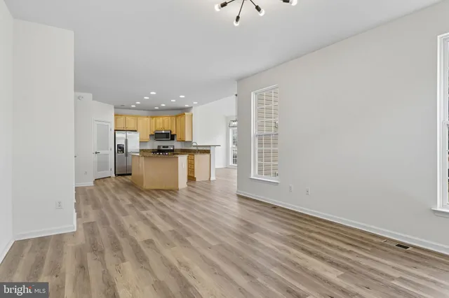 a view of kitchen with wooden floor
